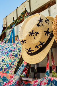 Close-up of clothes hanging at market stall