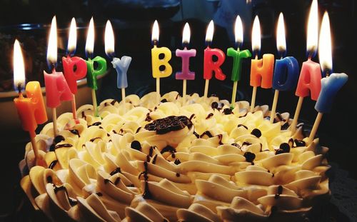 Close-up of birthday cake on table