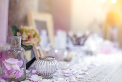 Close-up of pink roses on table