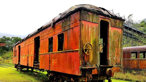 Abandoned train against sky