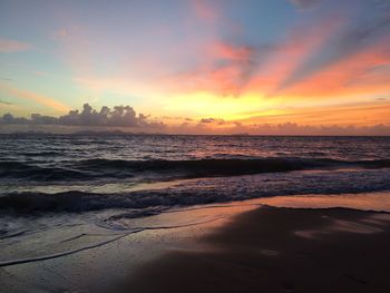 Scenic view of beach during sunset