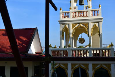 Low angle view of building against blue sky