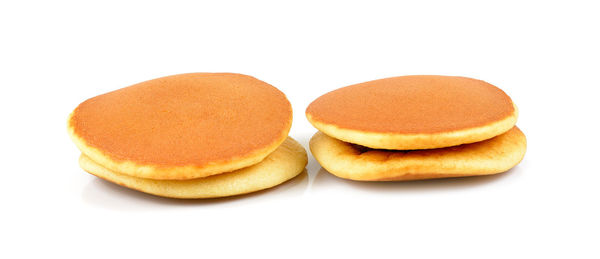 Close-up of cookies against white background