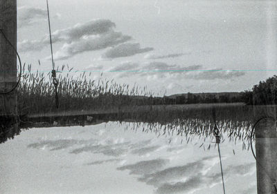 Scenic view of landscape against sky during winter