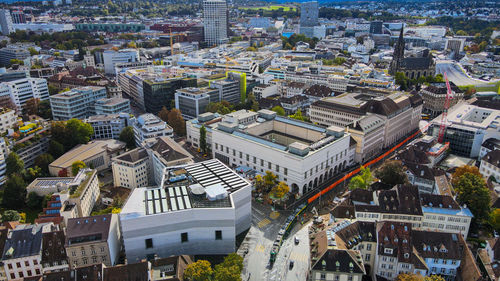 High angle view of street amidst buildings in city