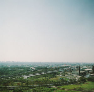 High angle view of agricultural field against clear sky