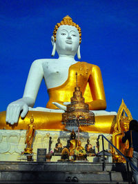 Low angle view of buddha statue