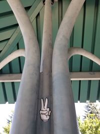 Low angle view of sculpture against building