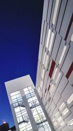 Low angle view of building against blue sky