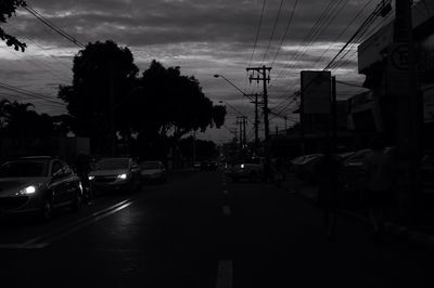 Car on road at sunset