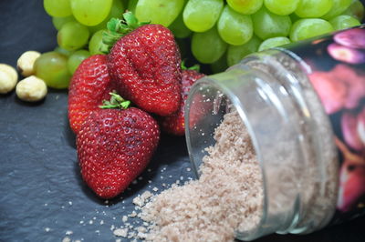 Close-up of chopped fruits on table