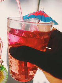 Close-up of hand holding drink