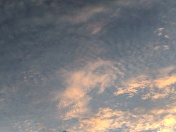 Low angle view of clouds in sky during sunset