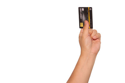 Close-up of woman hand against white background