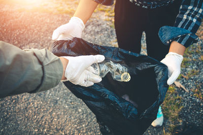 High angle view of people holding hands