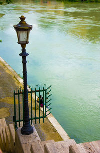 High angle view of street light by lake