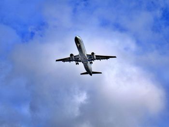 Jet plane below cloud base