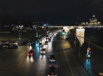 High angle view of traffic on city street at night