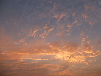 Low angle view of dramatic sky during sunset