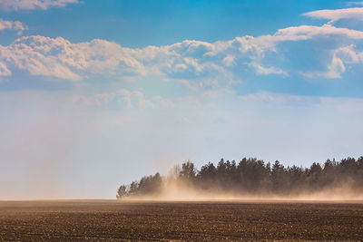 Scenic view of field against sky