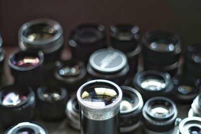 High angle view of camera lenses on table