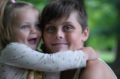 Portrait of brother with cute sister