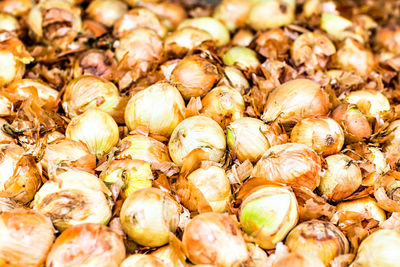 Full frame shot of onions for sale