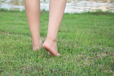 Low section of child on field