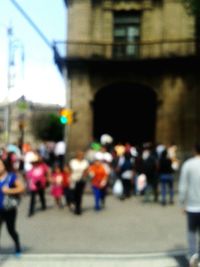 Defocused image of people in city