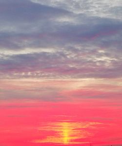 Low angle view of dramatic sky during sunset