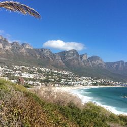 View of beach against cloudy sky