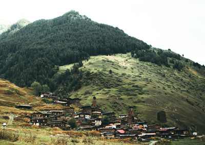 High angle view of trees and buildings against sky