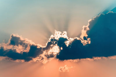 Low angle view of clouds in sky during sunset