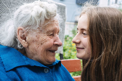 Senior woman looking at granddaughter