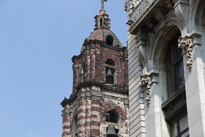 Low angle view of historic building against clear sky