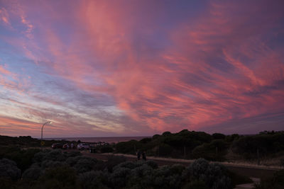 Scenic view of dramatic sky during sunset