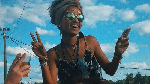 Portrait of man wearing sunglasses against sky