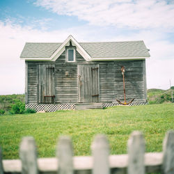 House on field against sky