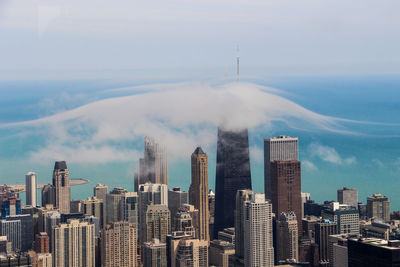 Aerial view of cityscape against sky in chicago 