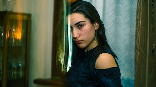 Digital composite image of young woman at home