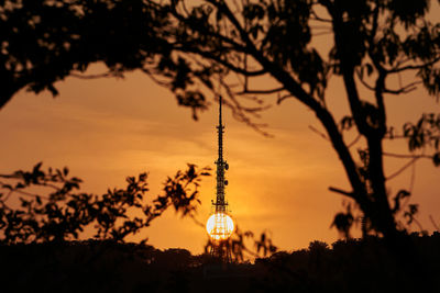 Silhouette of tower during sunset