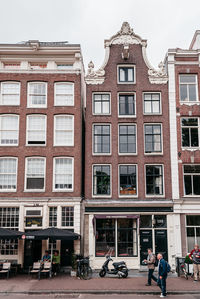 Facade of building against sky