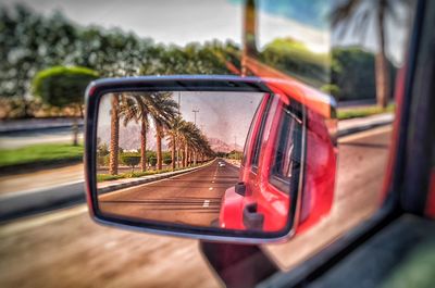 Close-up of car on side-view mirror