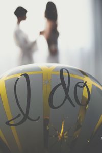 Close-up of woman with text