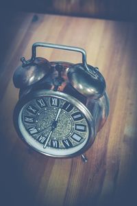 High angle view of clock on table