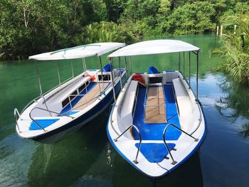 High angle view of boat moored on lake