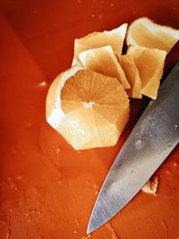 High angle view of chopped fruit on cutting board