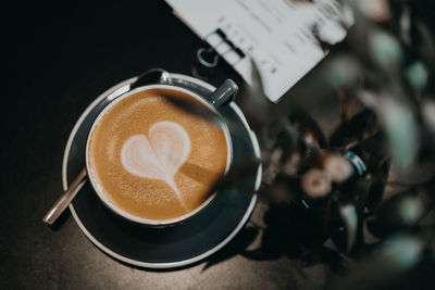 Close-up of coffee served on table