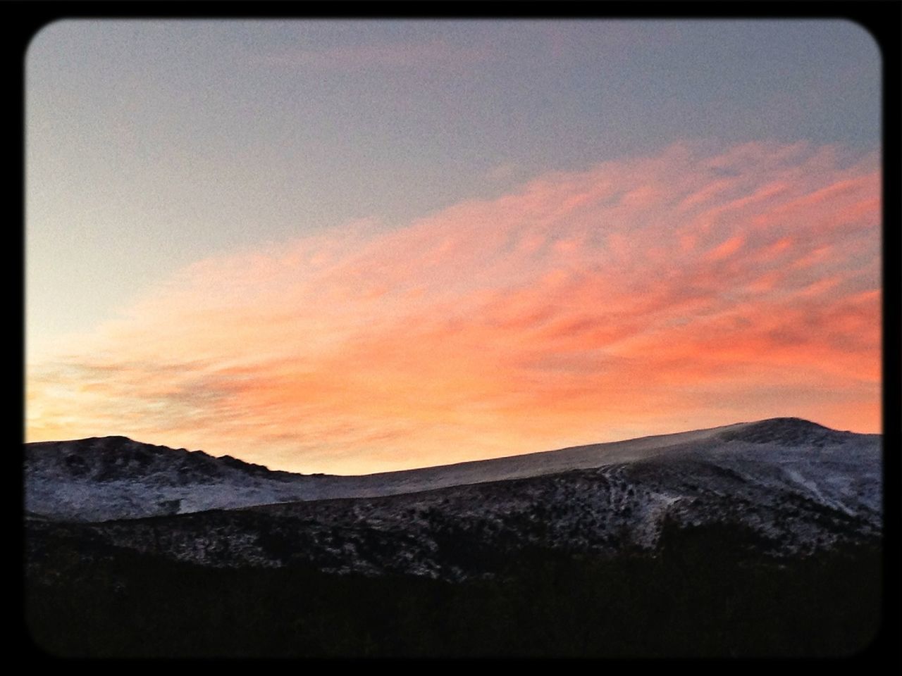 transfer print, sunset, orange color, scenics, auto post production filter, beauty in nature, tranquil scene, tranquility, snow, mountain, sky, winter, cold temperature, nature, landscape, mountain range, idyllic, season, cloud - sky, weather