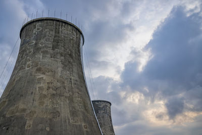 Low angle view of water tower against sky